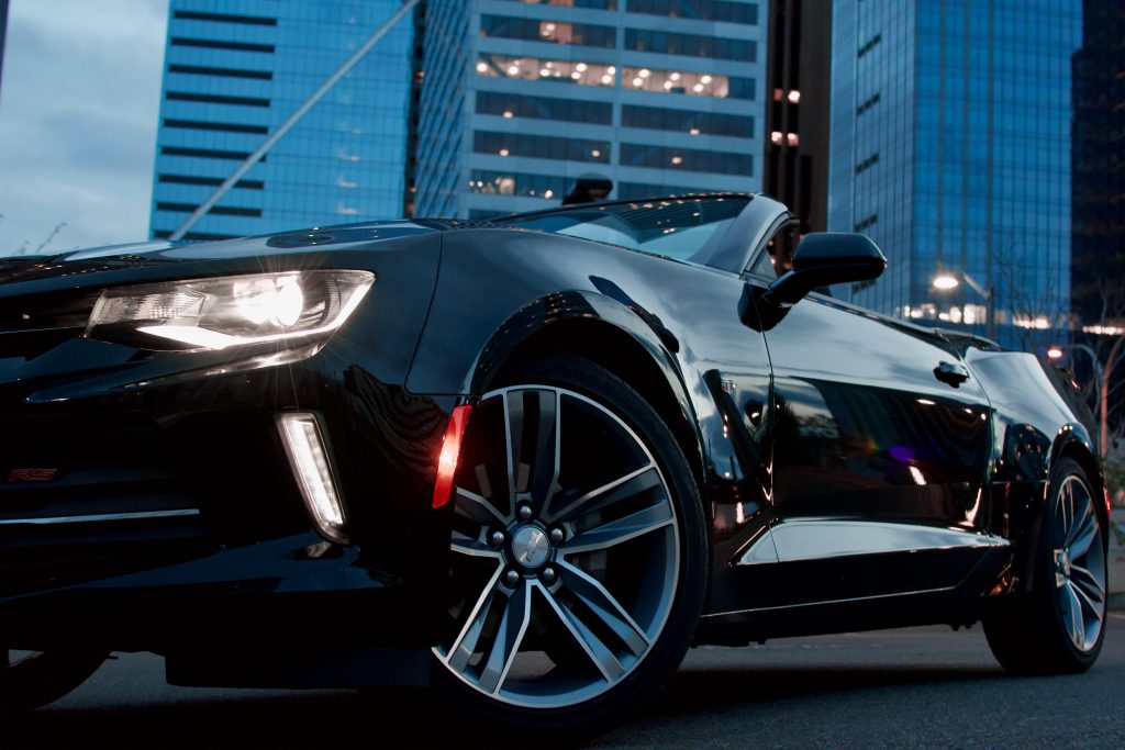 car parked in front of city building